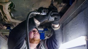 Harry working on a car