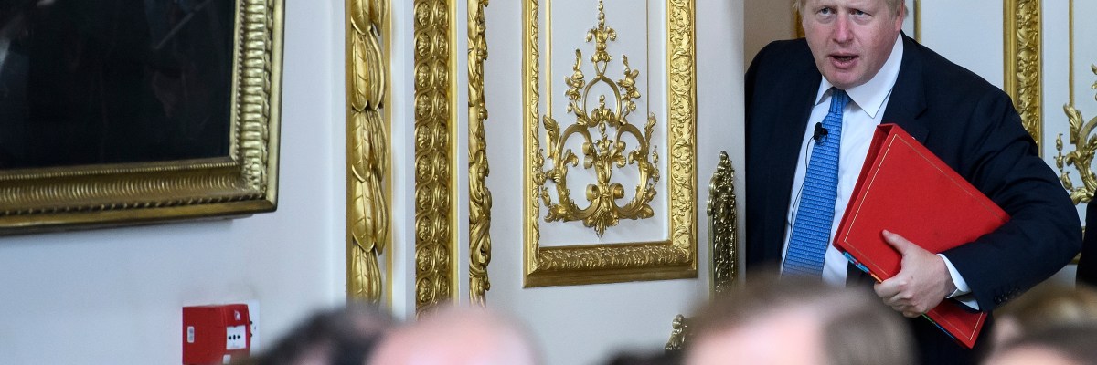 Boris shuffling into a room